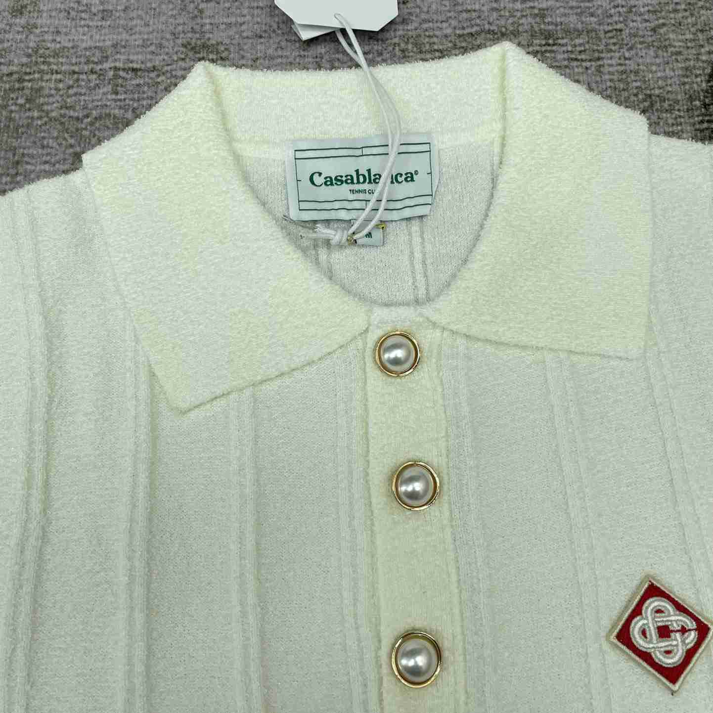 Casablanca Logo Appliqué Boucle Polo Shirt   D0016 - DopestKickz