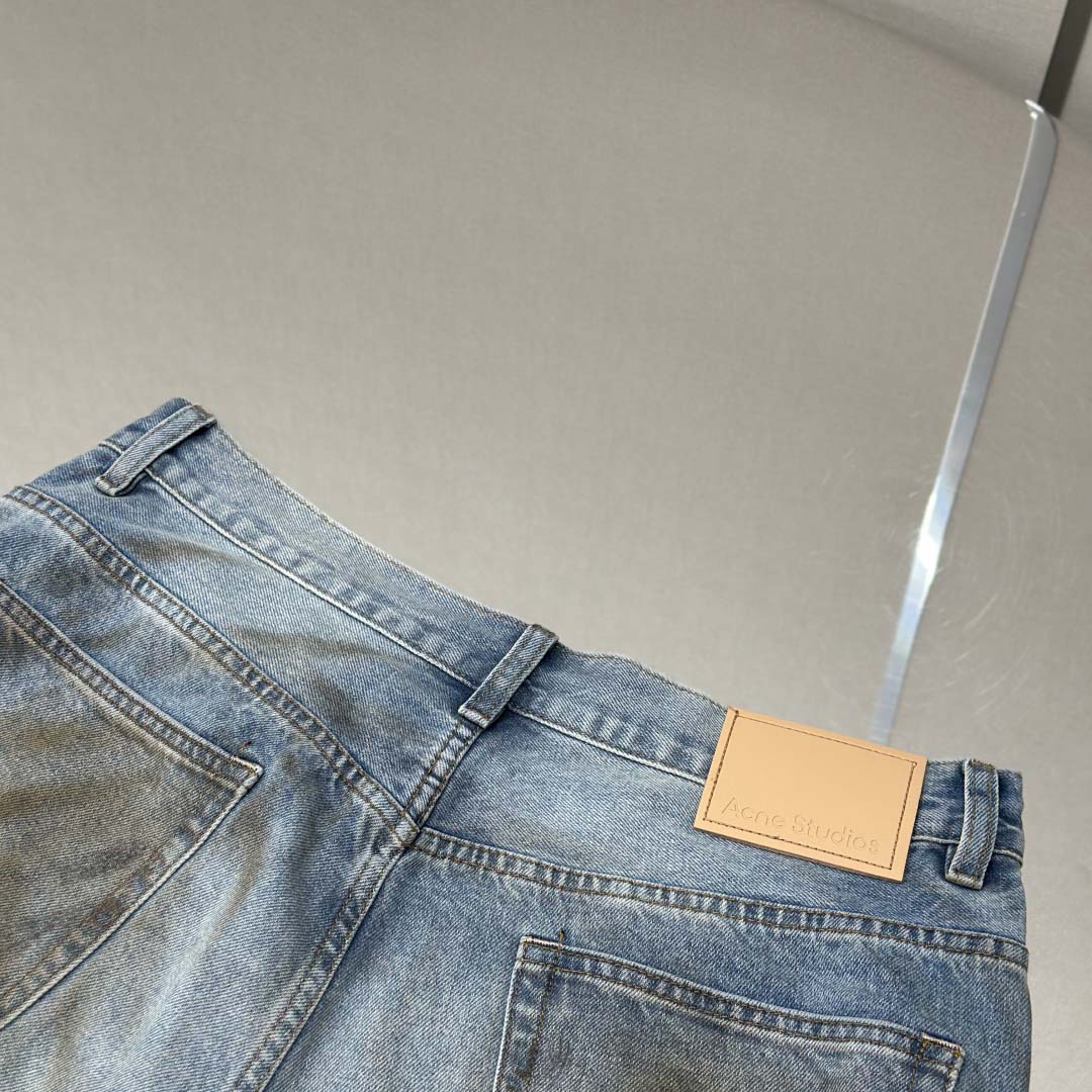 Acne Studios Mud-dyed torn jeans - DopestKickz