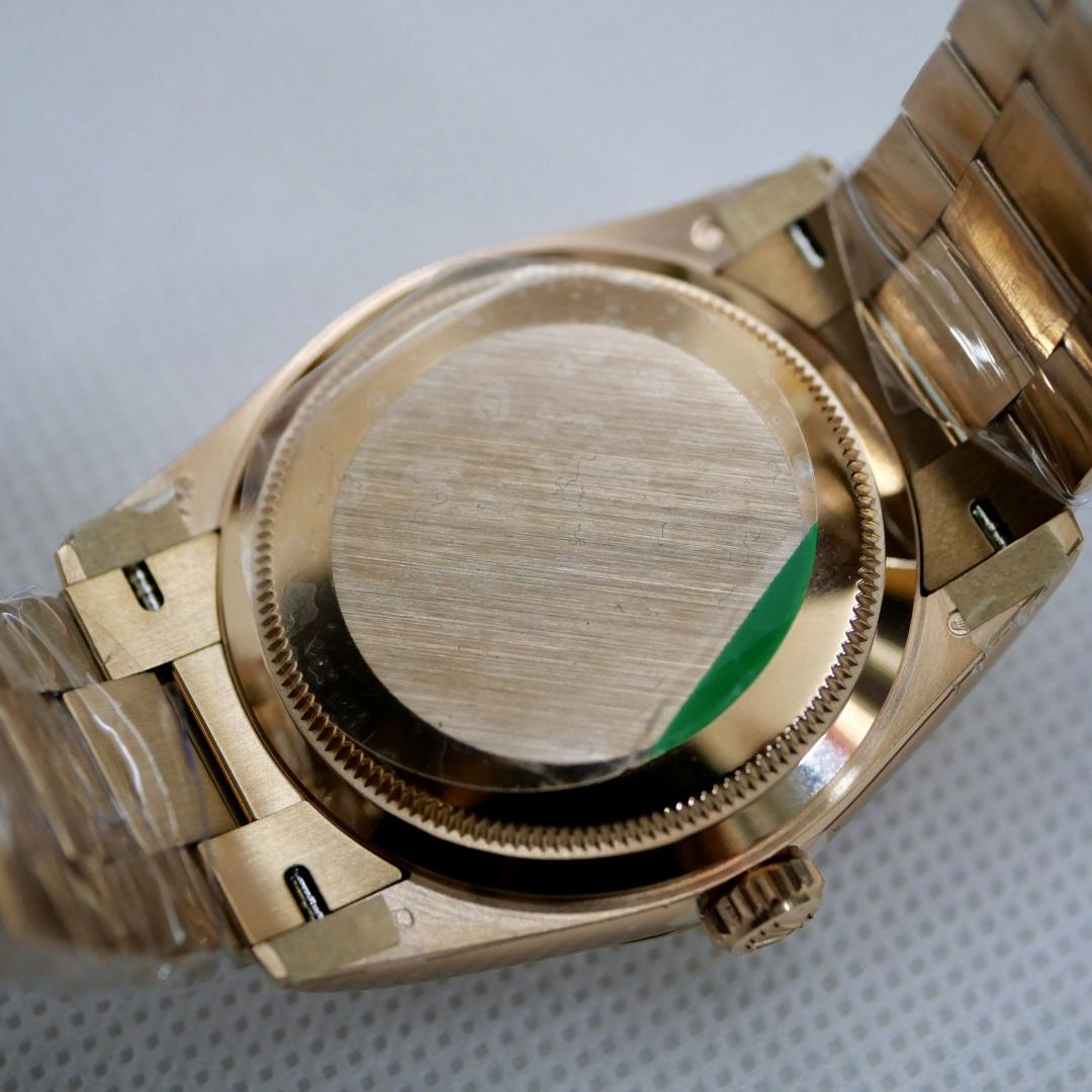 Rolex Oyster Perpetual Day-Date, 36mm, rose gold  128235 - DopestKickz