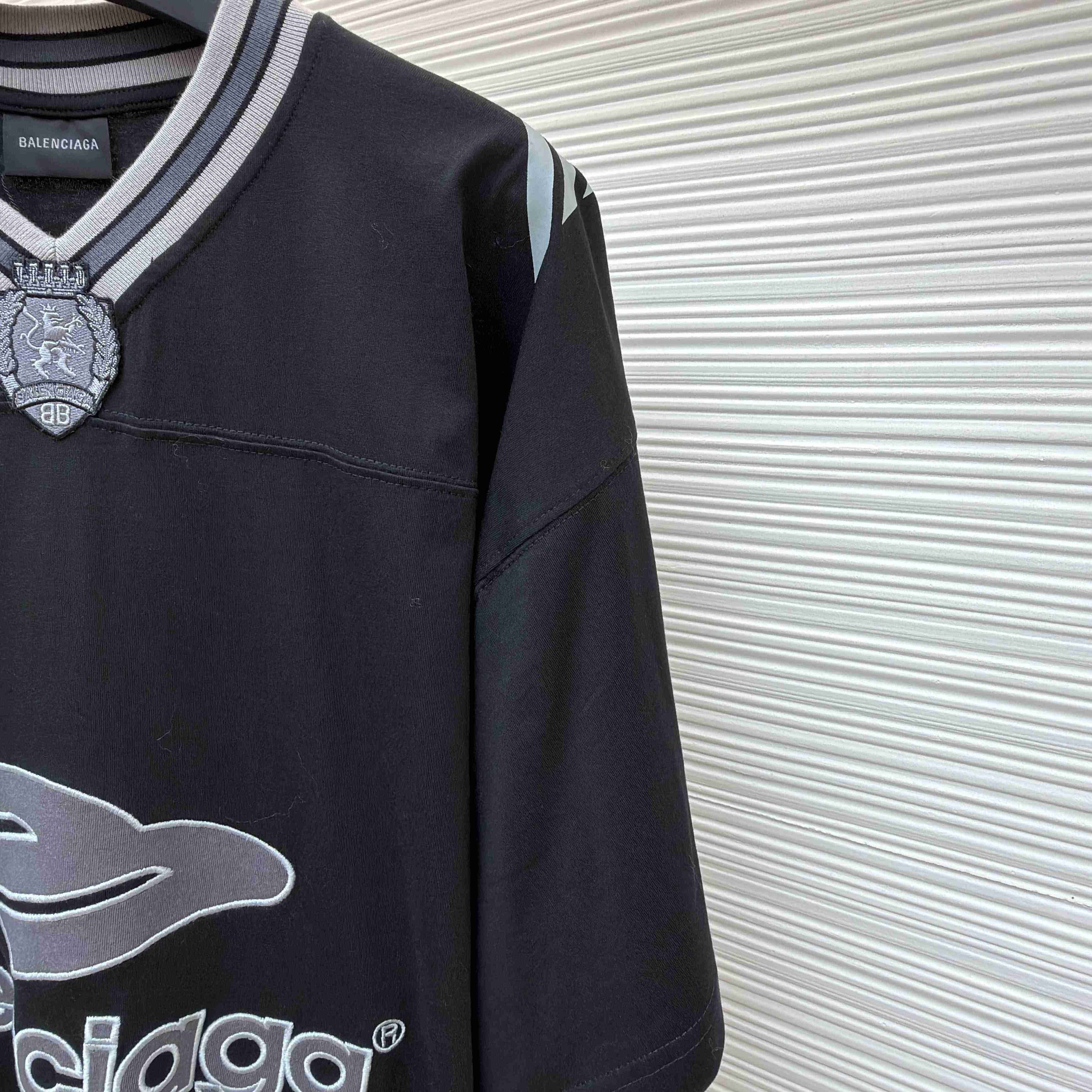 Balenciaga B Football V-Neck T-Shirt Oversized In Black - DopestKickz