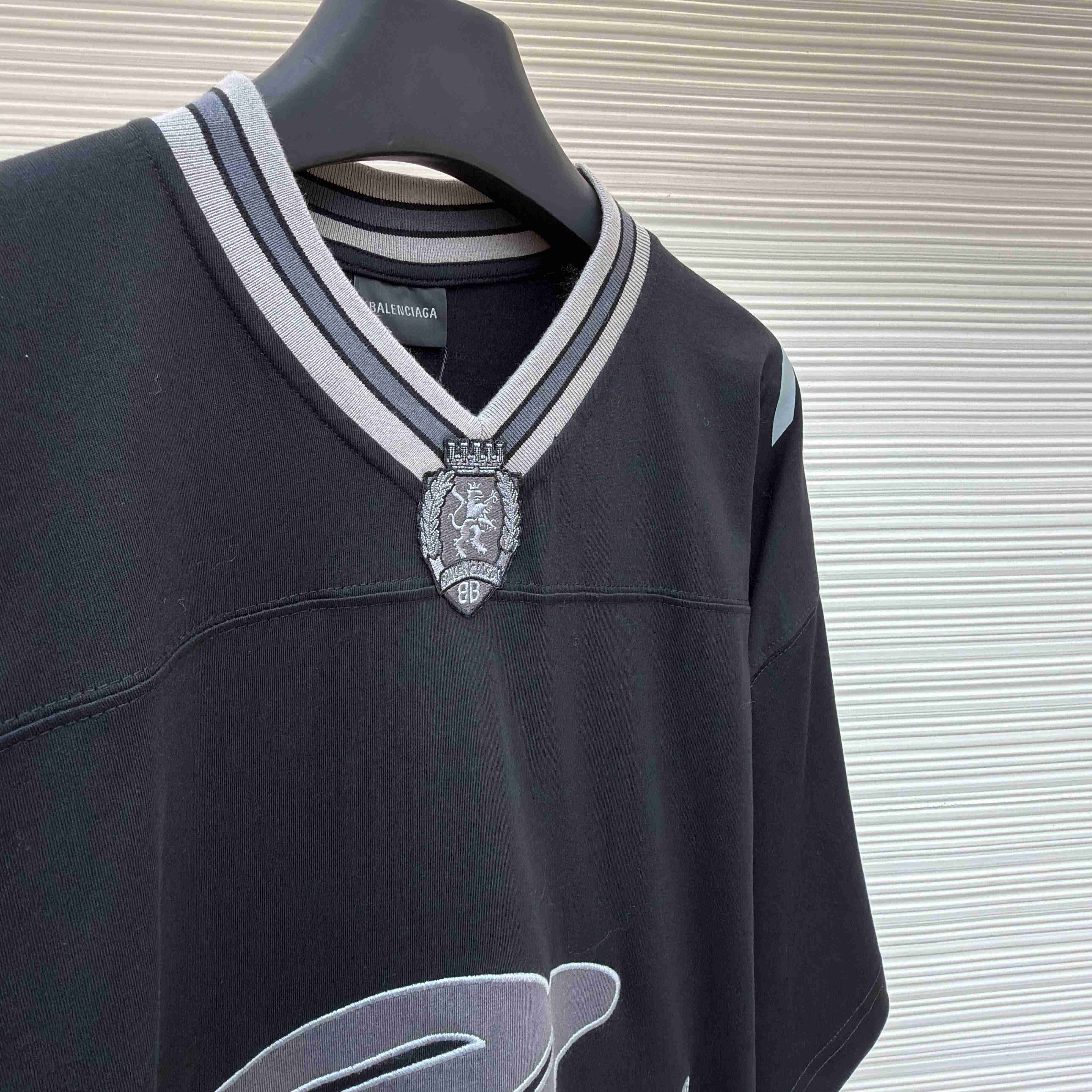 Balenciaga B Football V-Neck T-Shirt Oversized In Black - DopestKickz