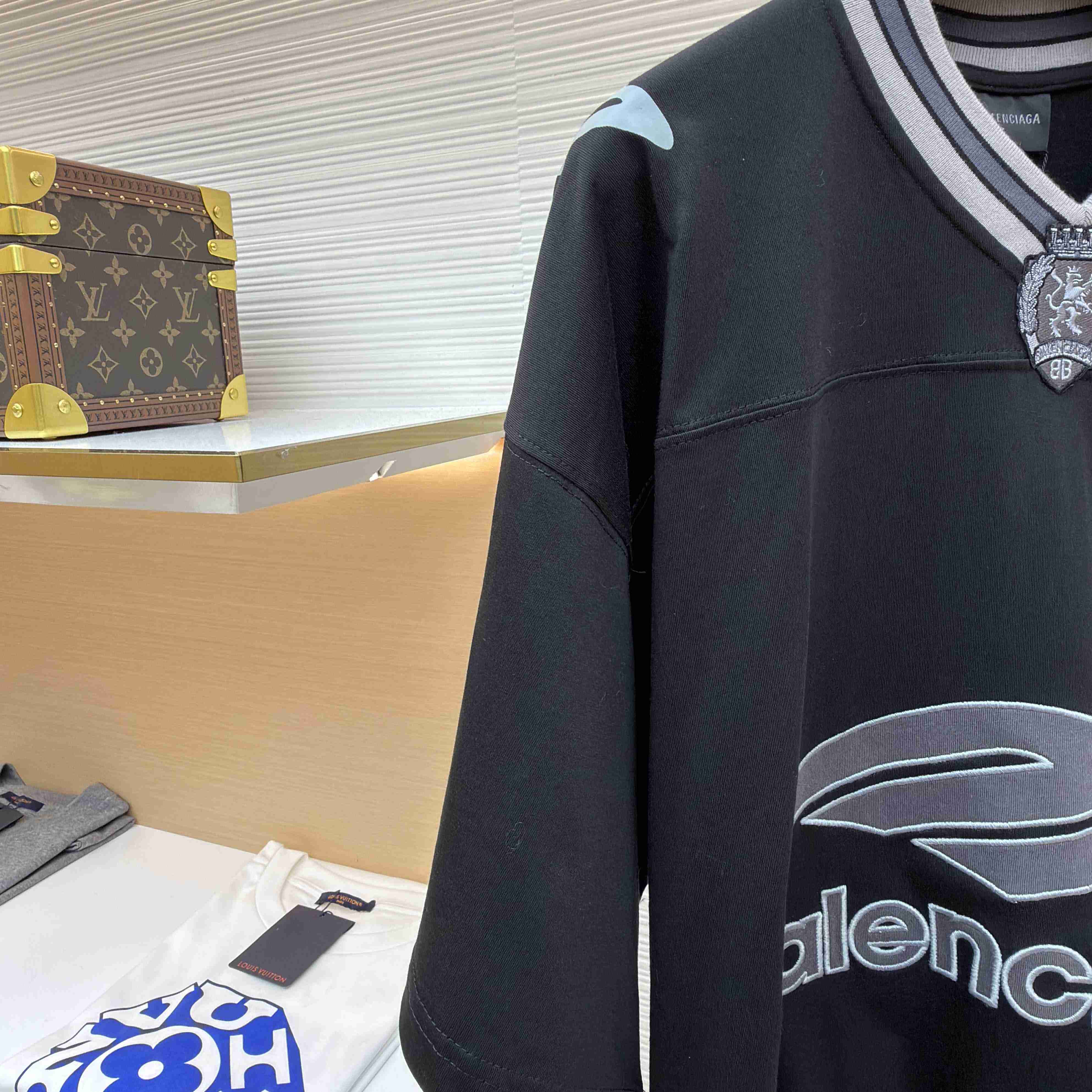 Balenciaga B Football V-Neck T-Shirt Oversized In Black - DopestKickz