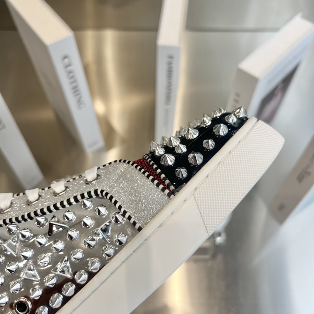 Christian Louboutin High-Top Sneakers - DopestKickz