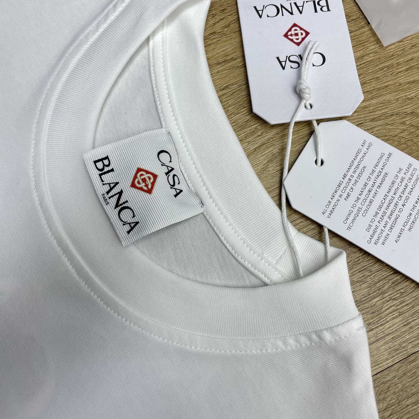 Casablanca White Innocence Triangle T-shirt Regular price C1120 - DopestKickz