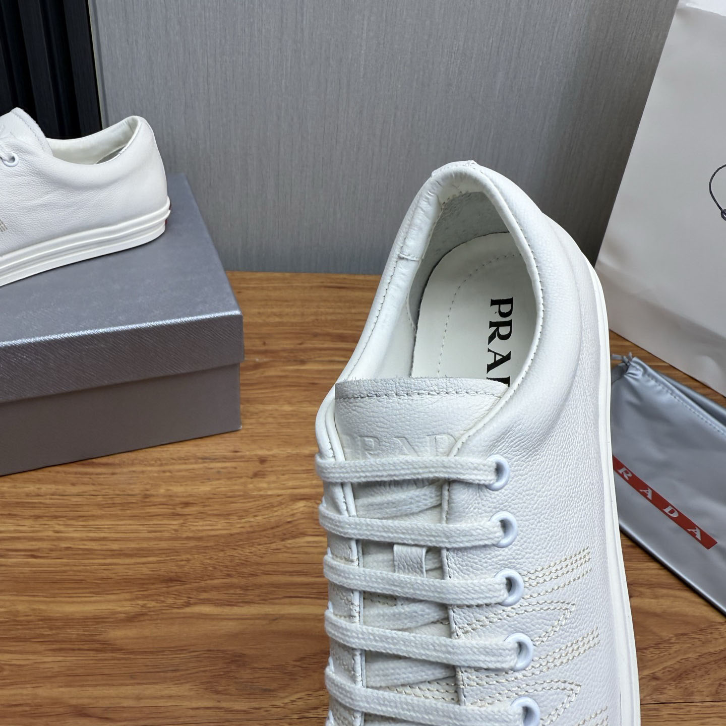 Prada Distressed Leather Sneakers - DopestKickz
