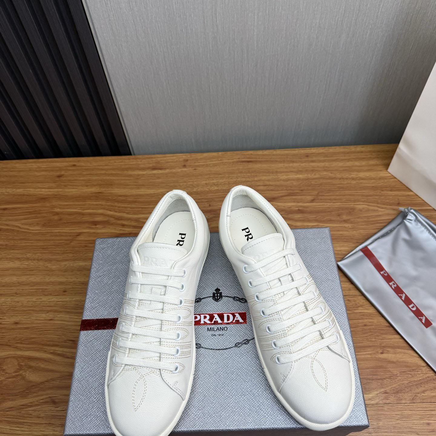 Prada Distressed Leather Sneakers - DopestKickz