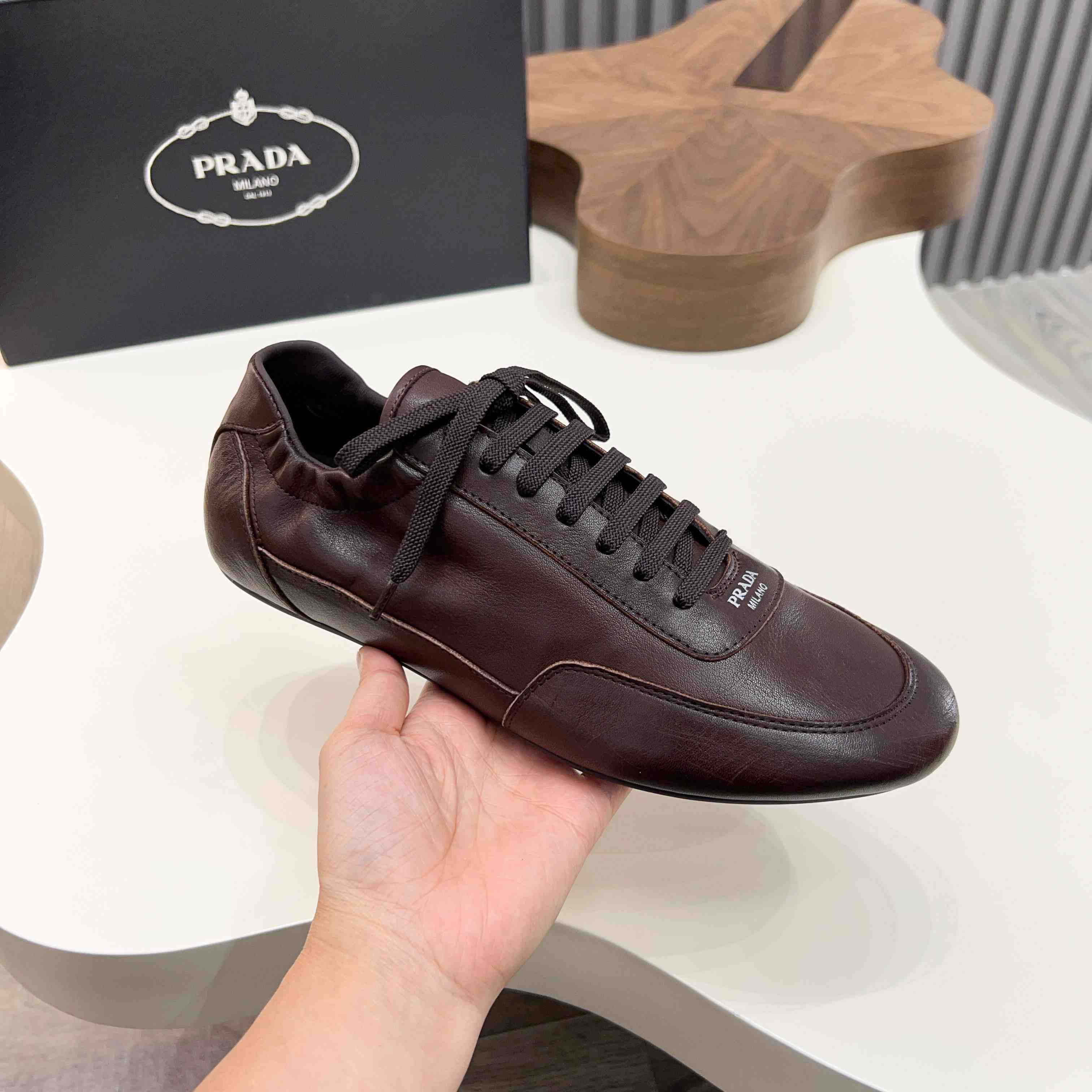 Prada Collapse Leather Sneakers - DopestKickz