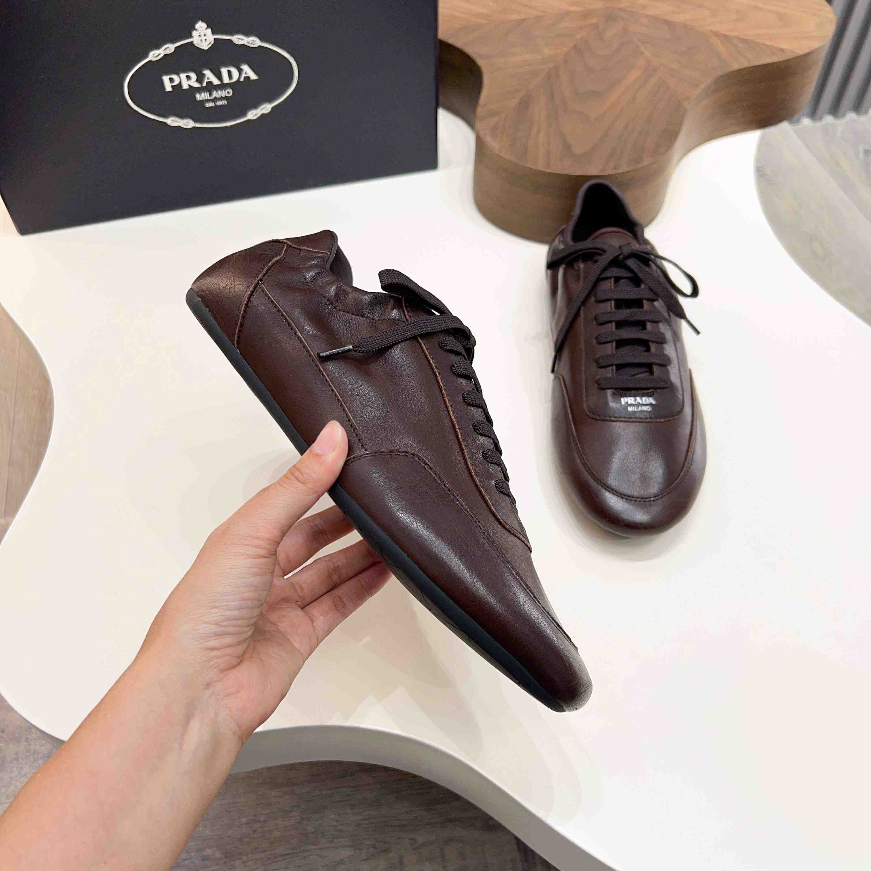 Prada Collapse Leather Sneakers - DopestKickz