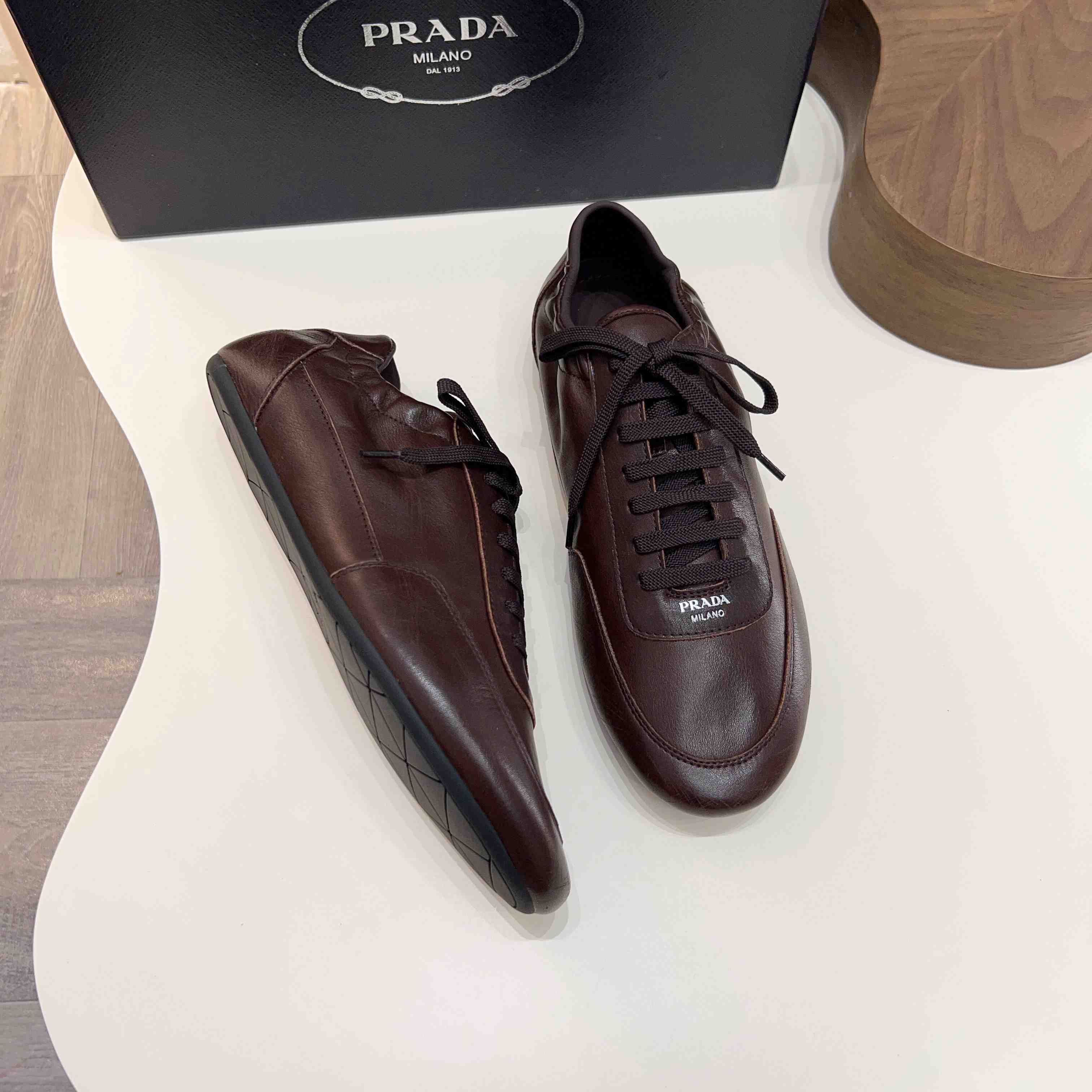 Prada Collapse Leather Sneakers - DopestKickz