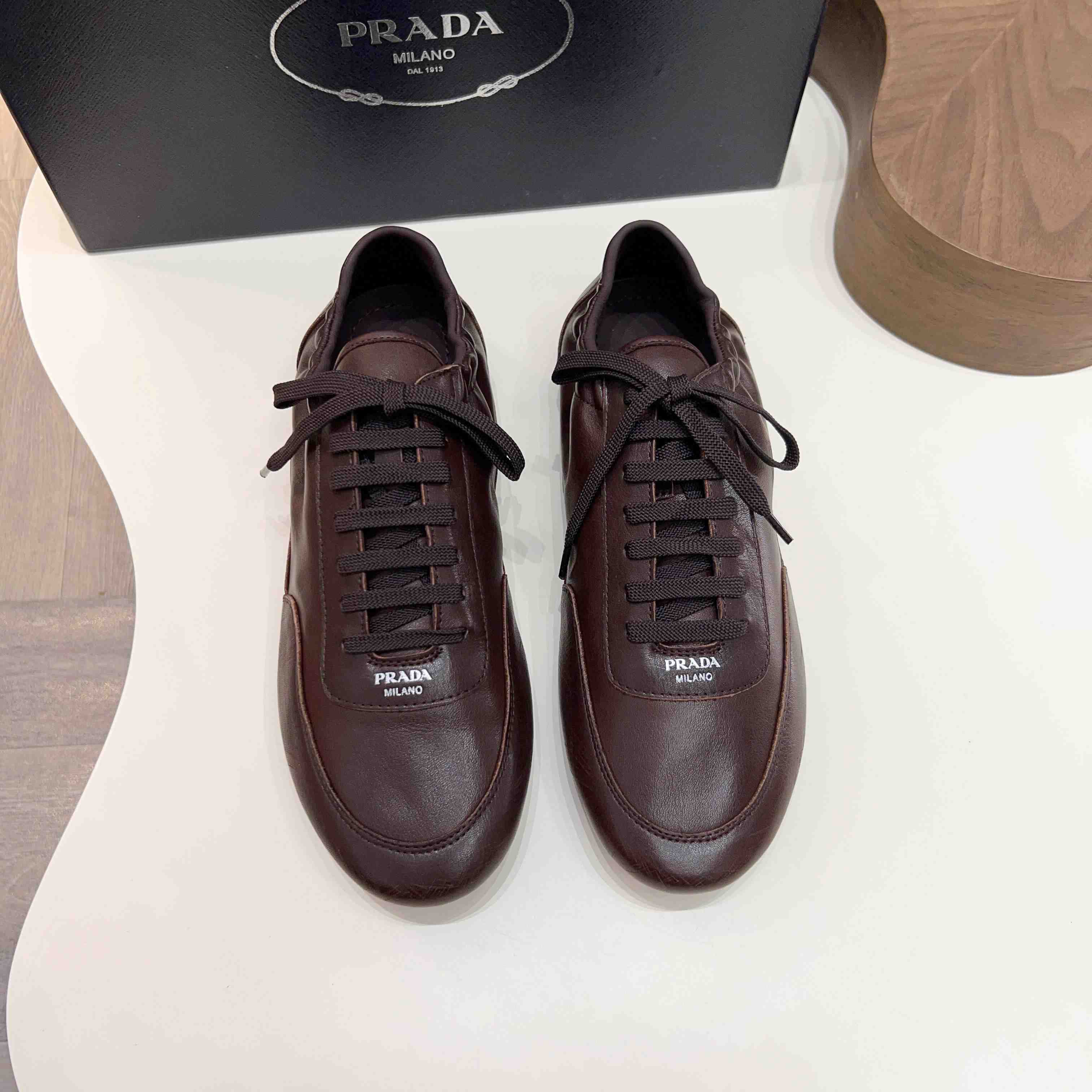 Prada Collapse Leather Sneakers - DopestKickz