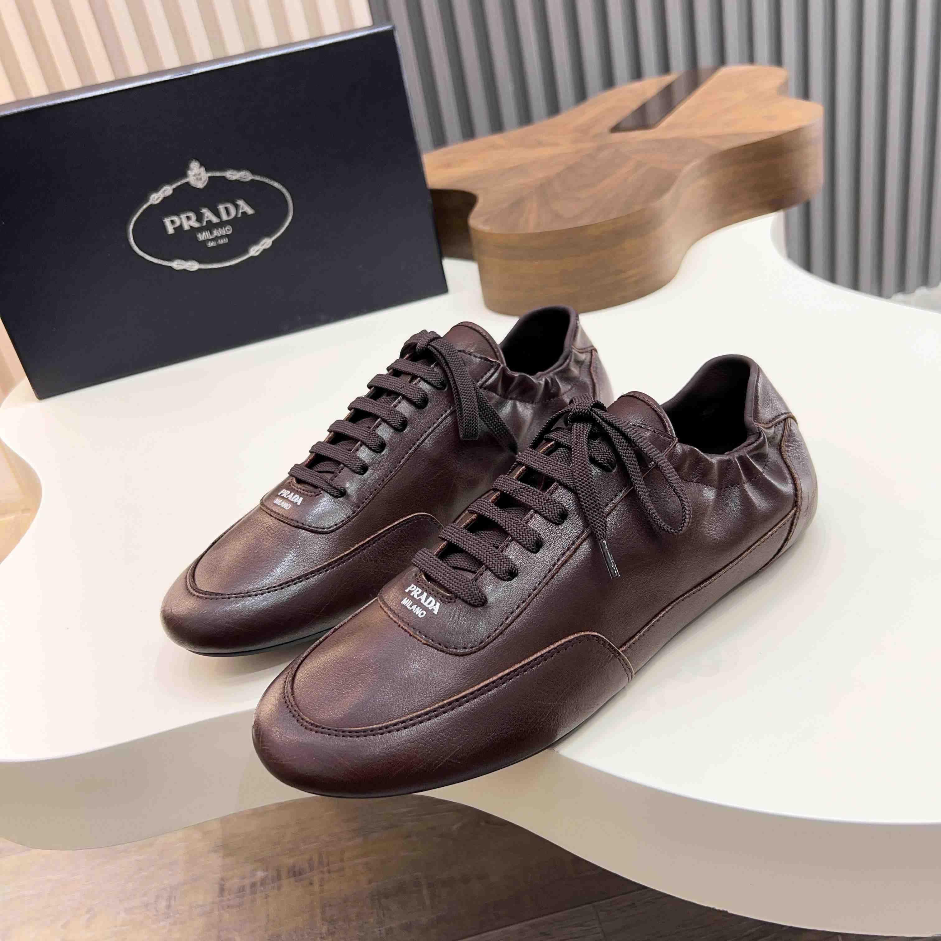 Prada Collapse Leather Sneakers - DopestKickz