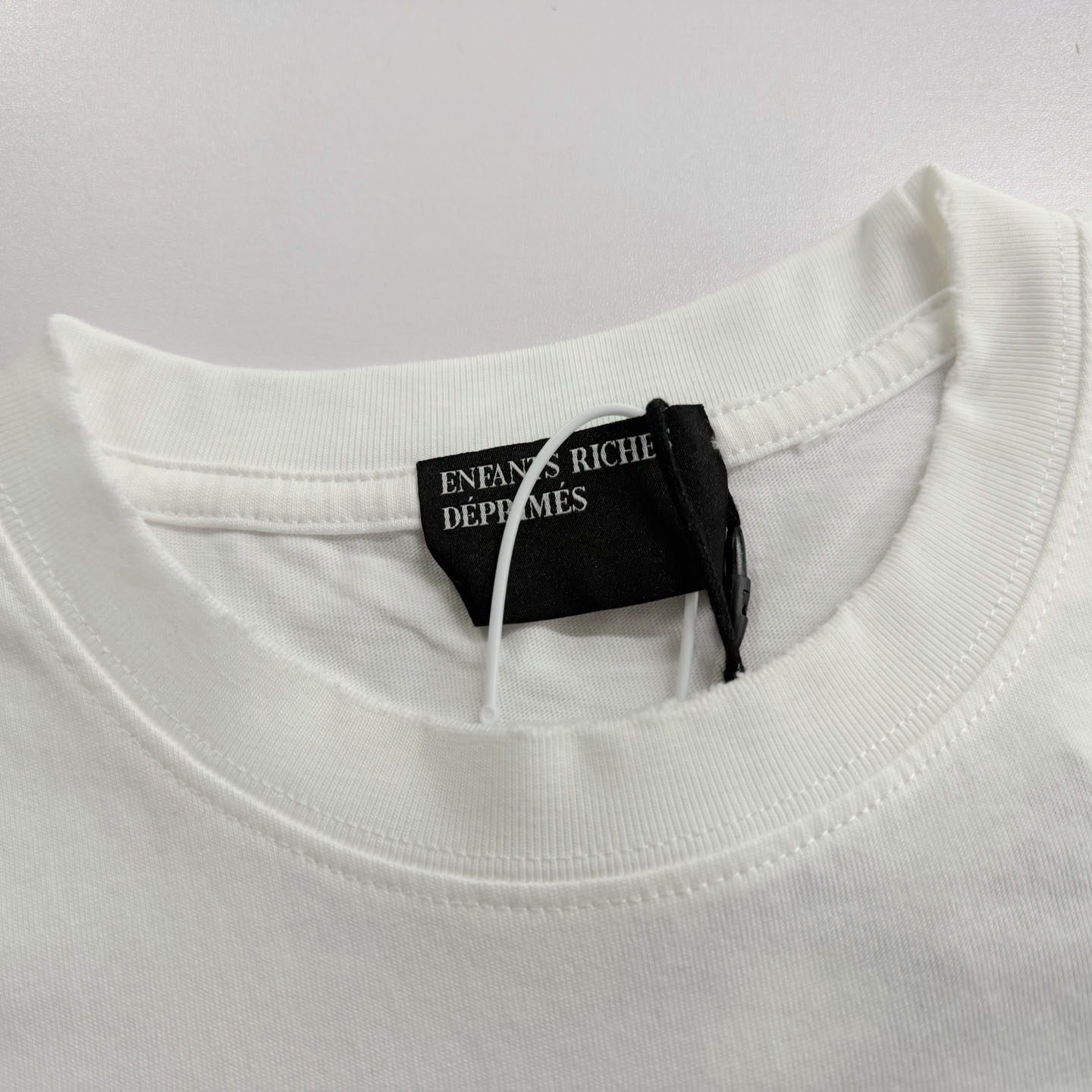 Enfants Riches Déprimés  Distressed Logo-Print Cotton-Jersey T-Shirt - White - DopestKickz