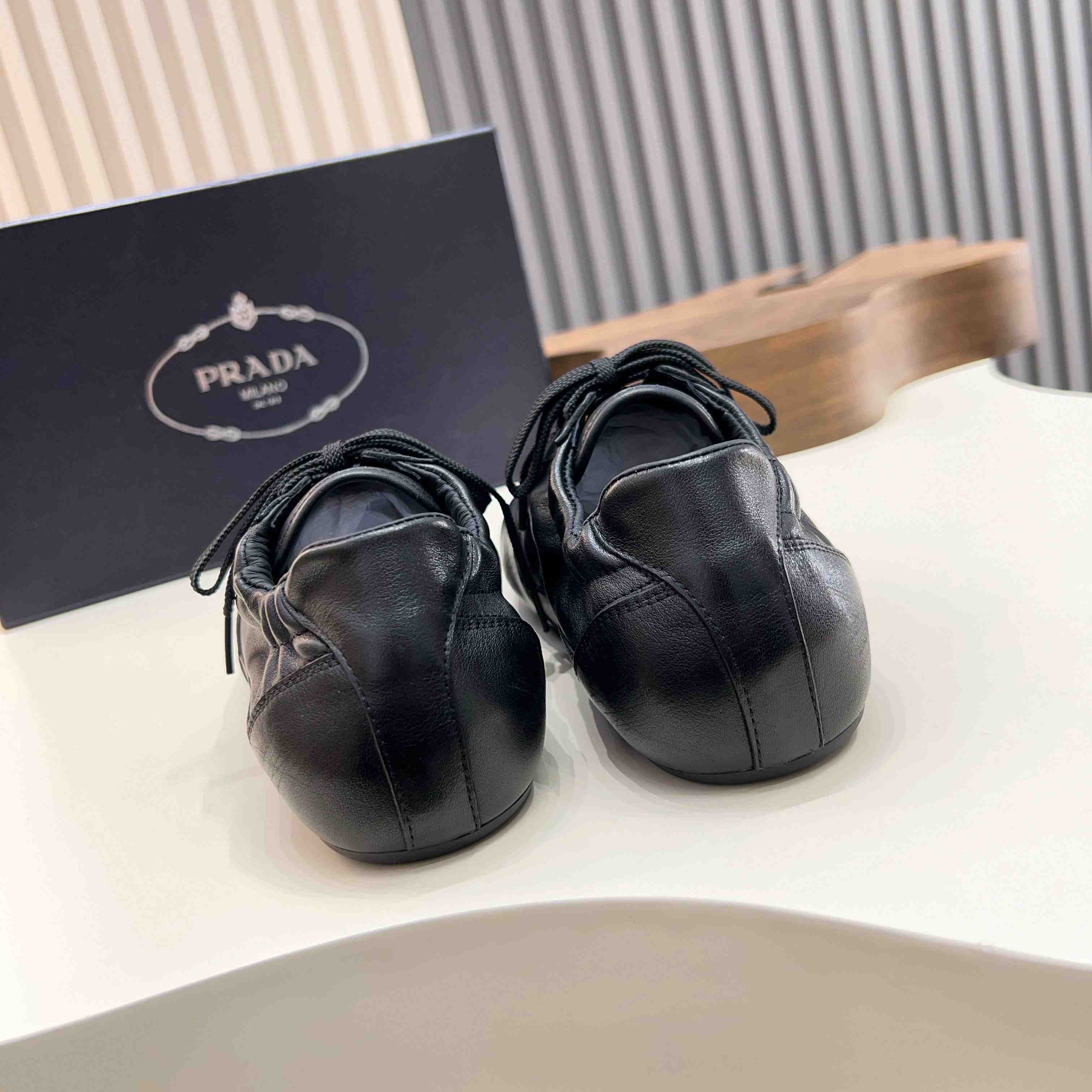 Prada Collapse Leather Sneakers - DopestKickz