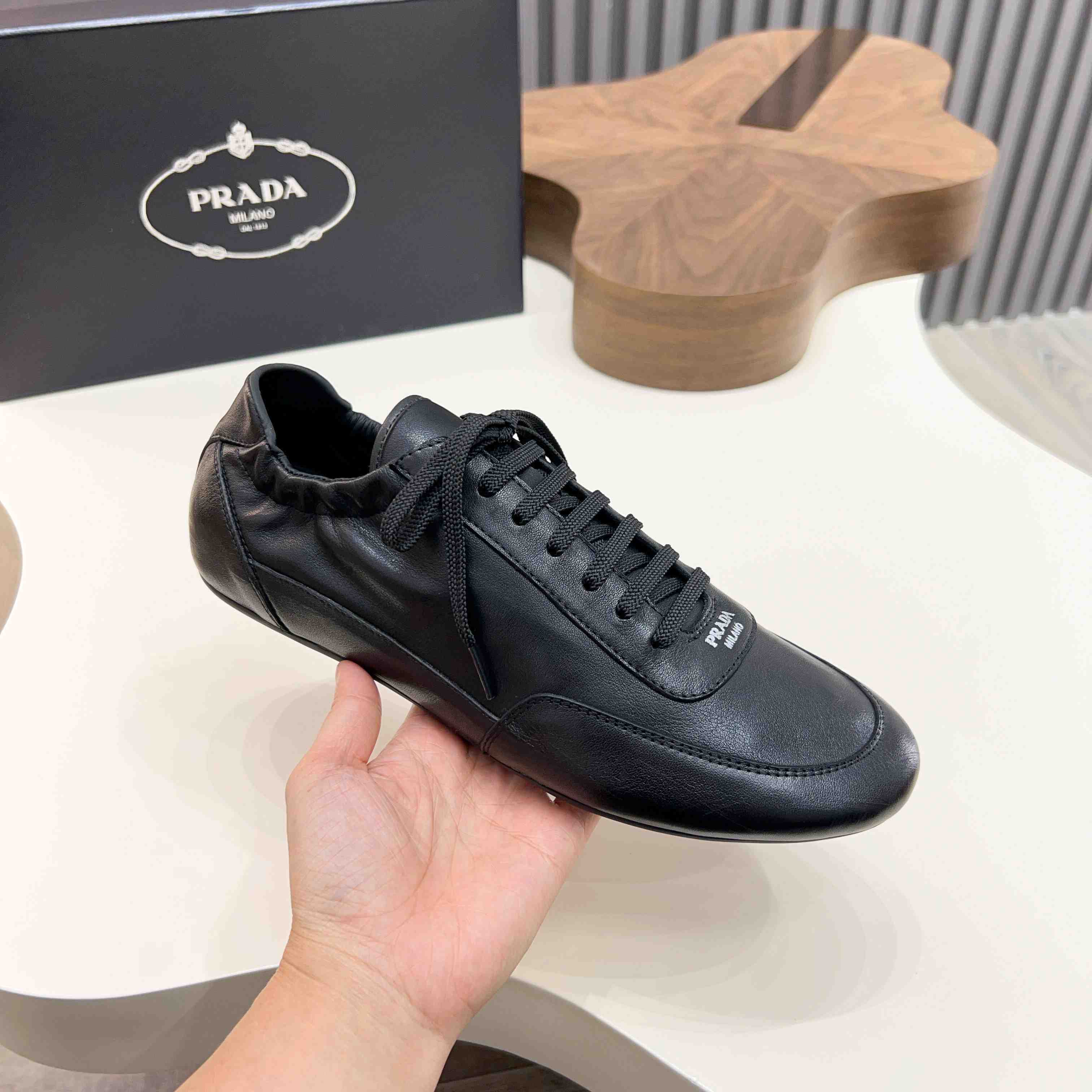 Prada Collapse Leather Sneakers - DopestKickz
