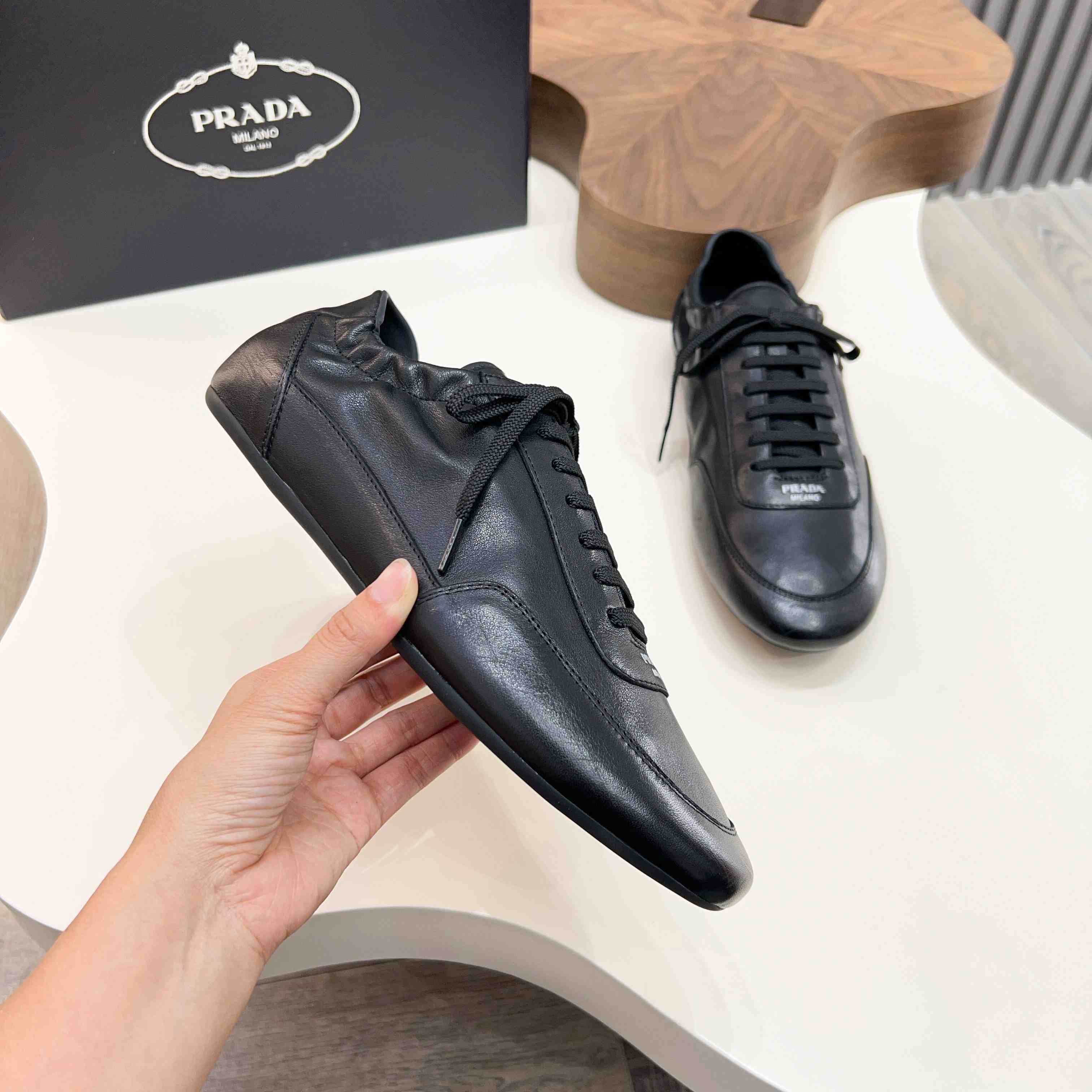 Prada Collapse Leather Sneakers - DopestKickz