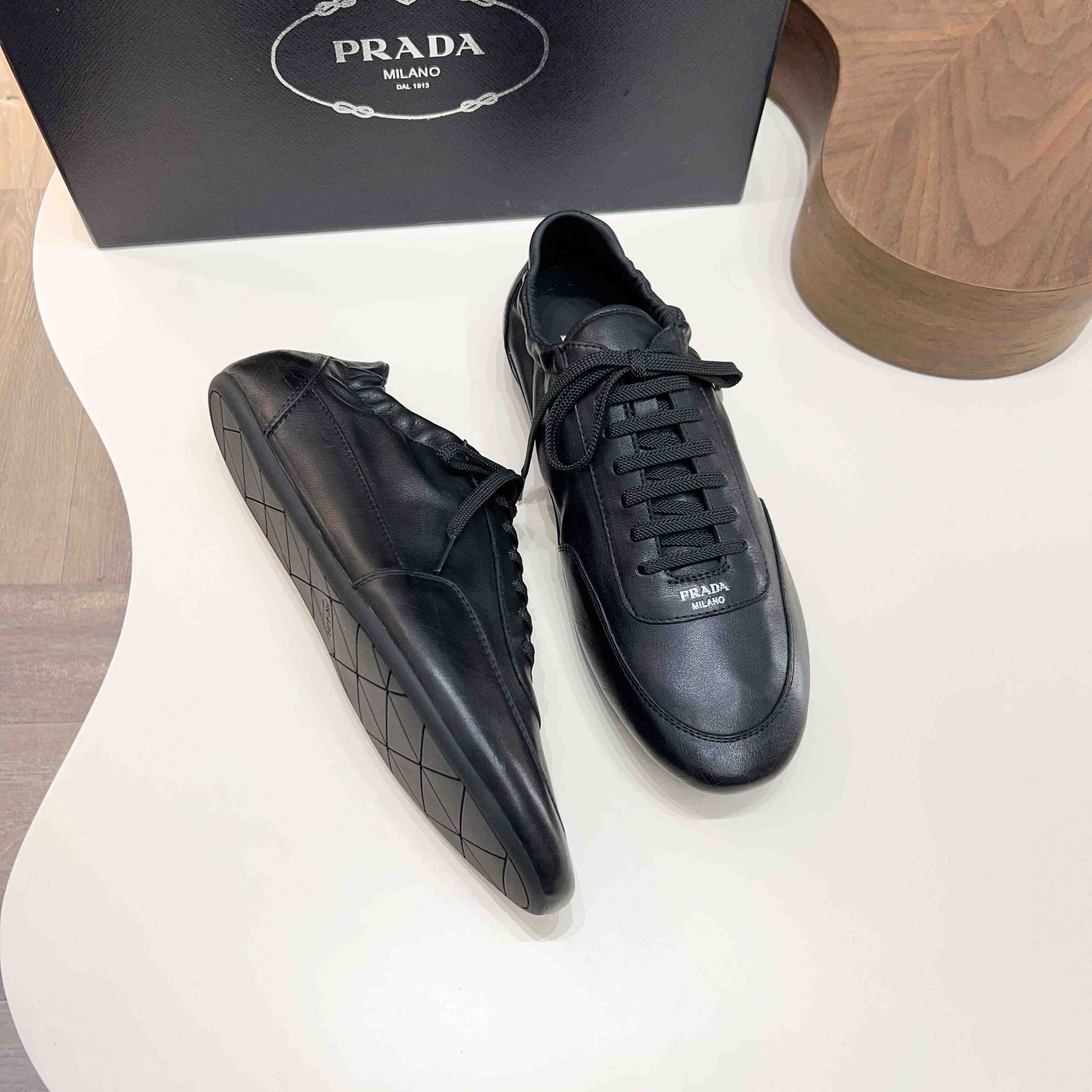 Prada Collapse Leather Sneakers - DopestKickz