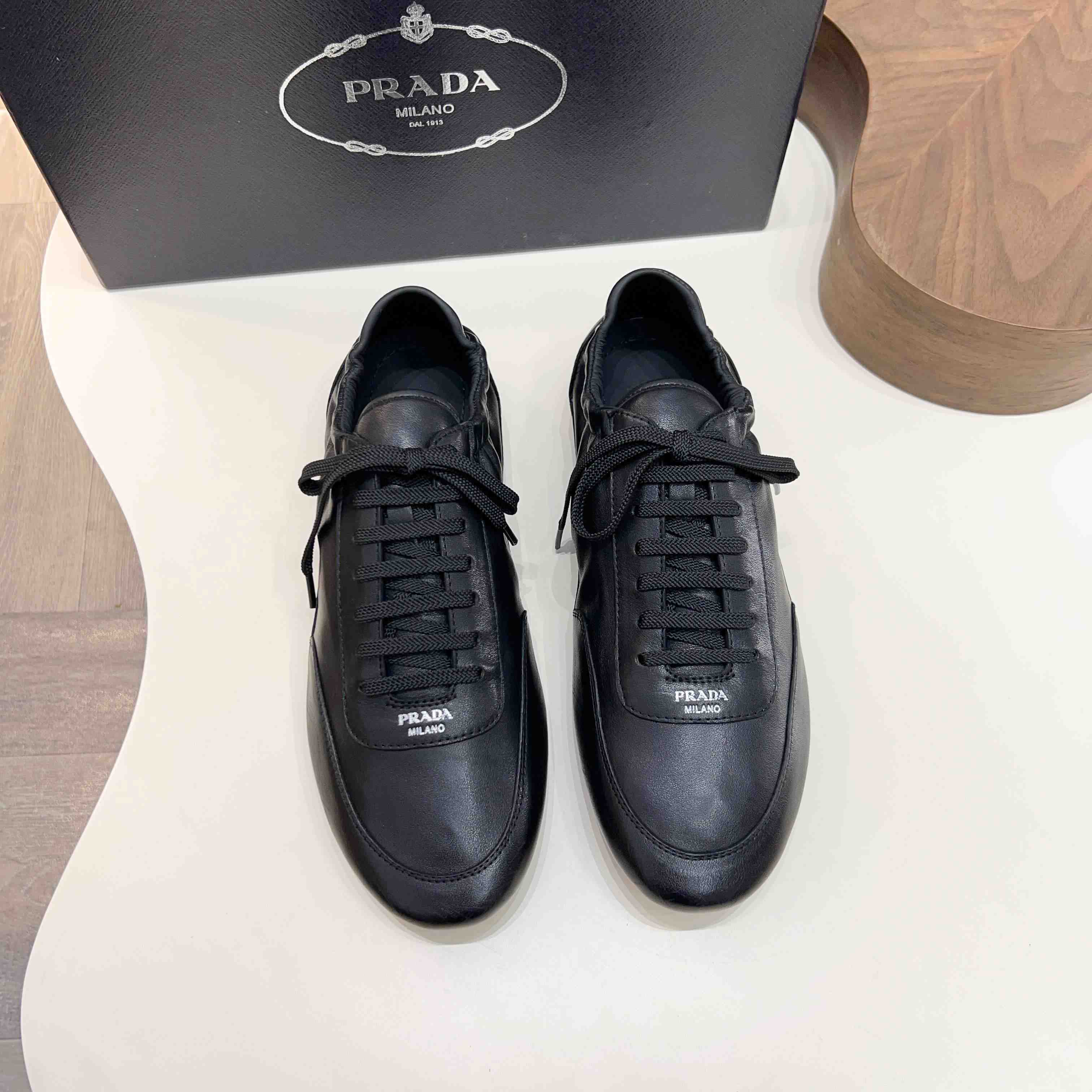 Prada Collapse Leather Sneakers - DopestKickz