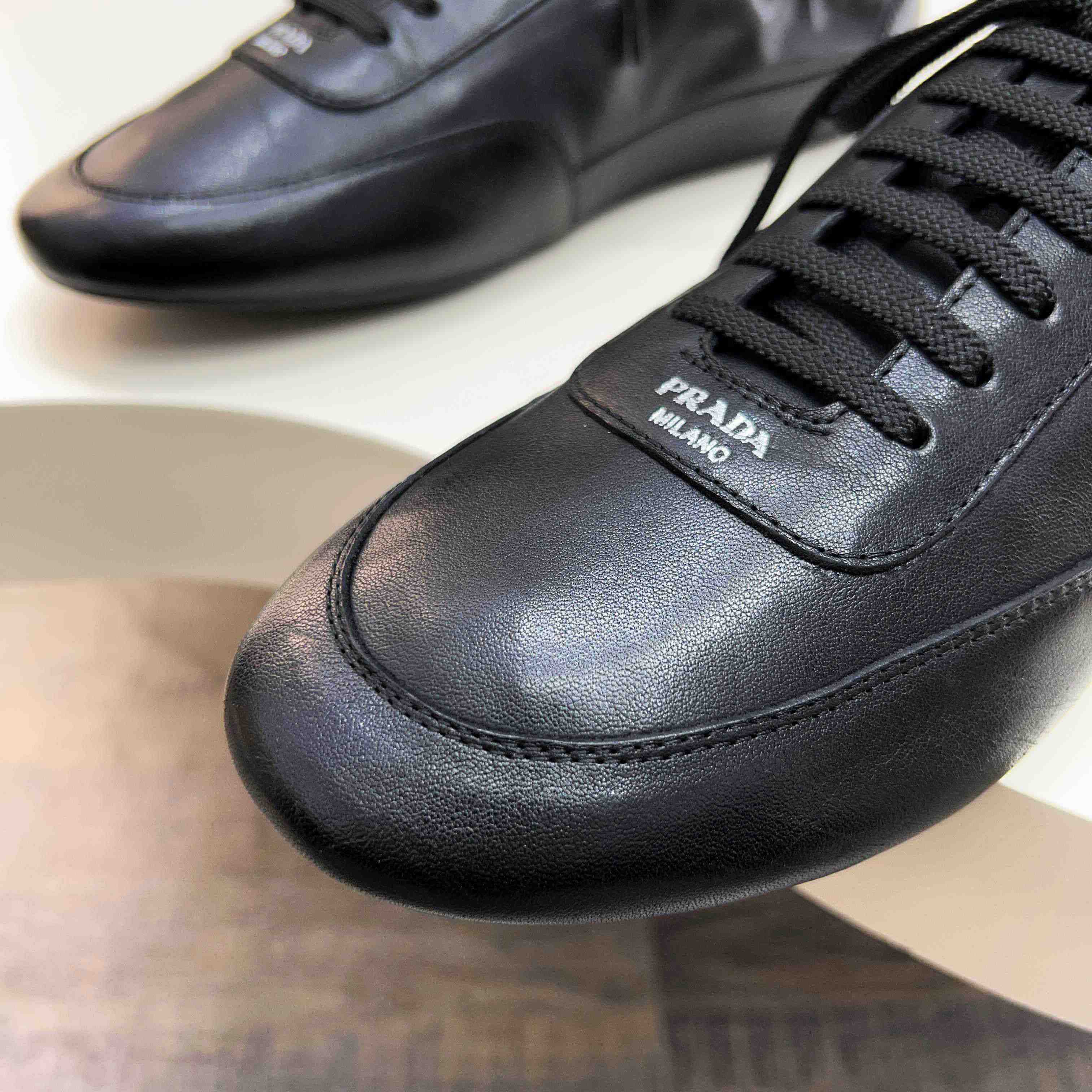 Prada Collapse Leather Sneakers - DopestKickz