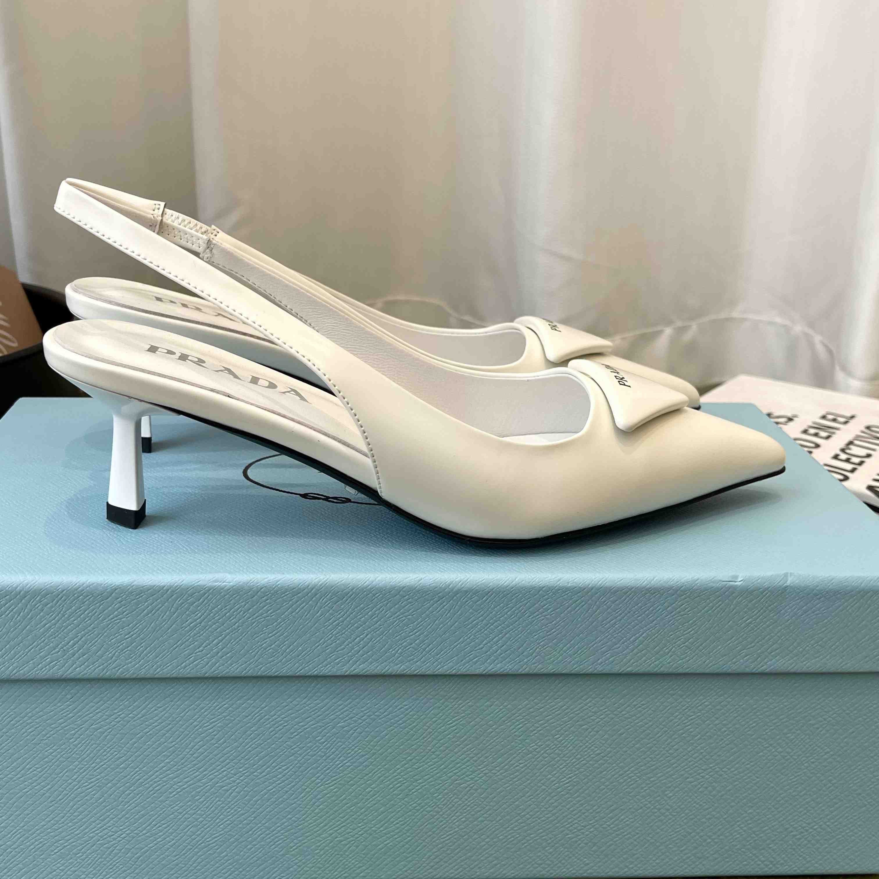 Prada Patent Leather Slingback Pumps - DopestKickz