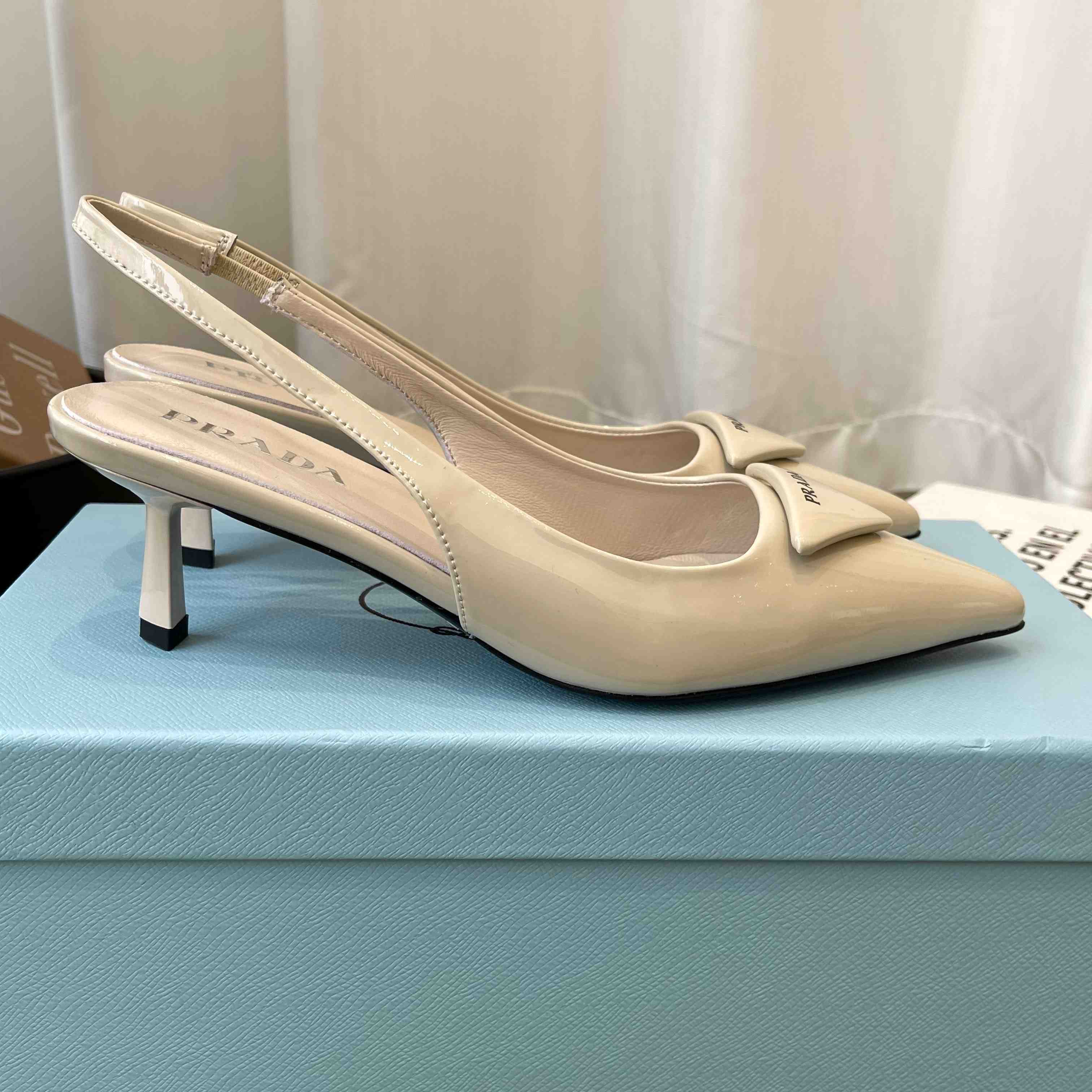 Prada Patent Leather Slingback Pumps - DopestKickz